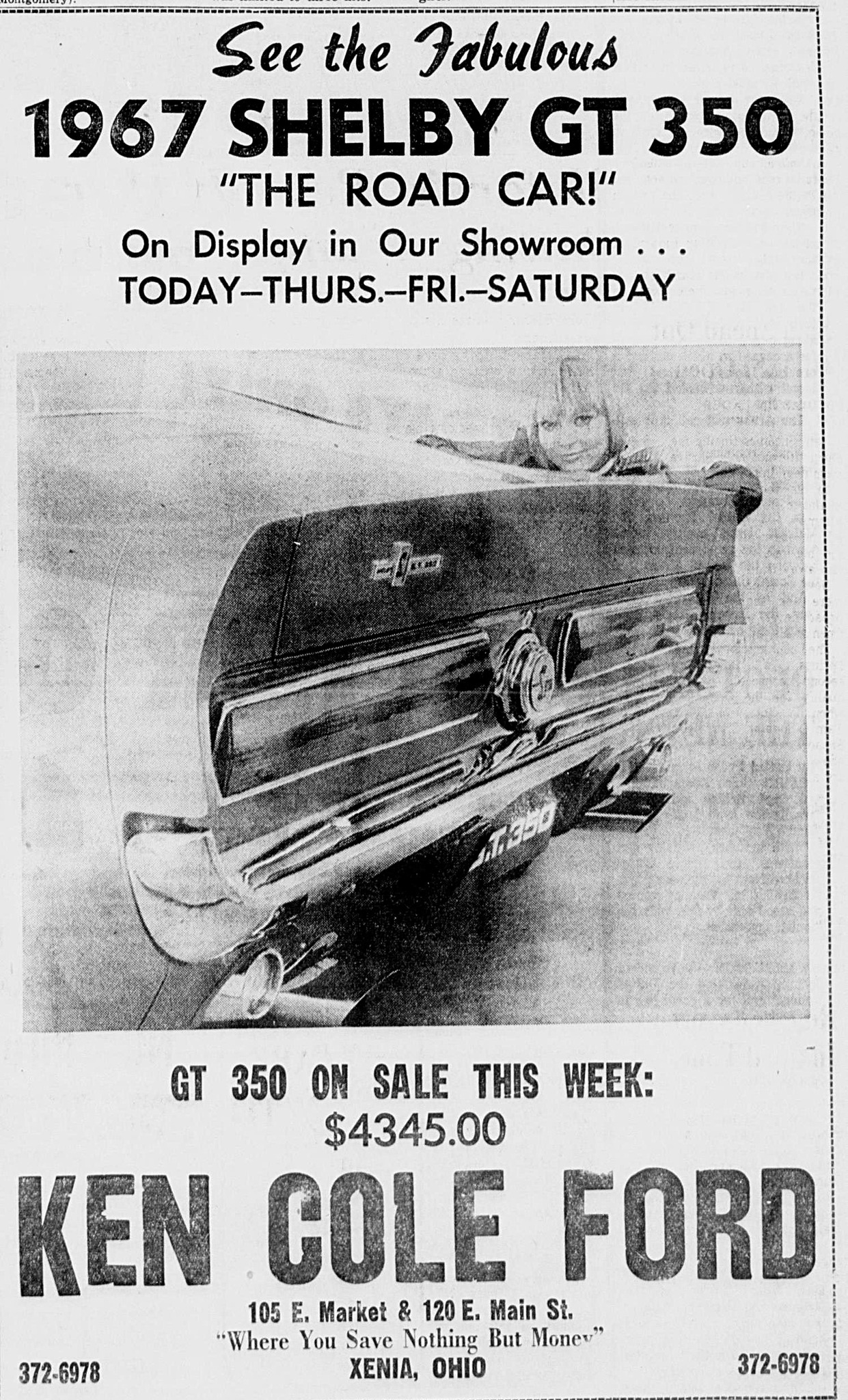 Ken Cole Ford advertisies the '67 Shelby Ford sales district demonstrator at their dealership