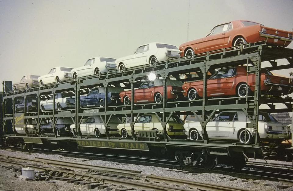 15 Ford Mustangs on a Trailer Train railway car